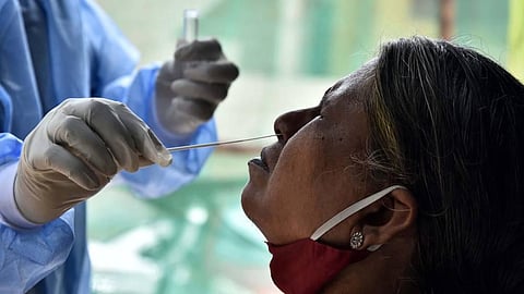 A swab test being done at a medical camp on a resident of Ganeshapuram Vyasarapadi on Monday in Chennai. (Photo | P Jawahar, EPS)