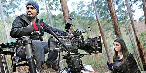 Cinematographer Kharthik Palani and actress Keerthy Suresh during the filming of 'Penguin'.
