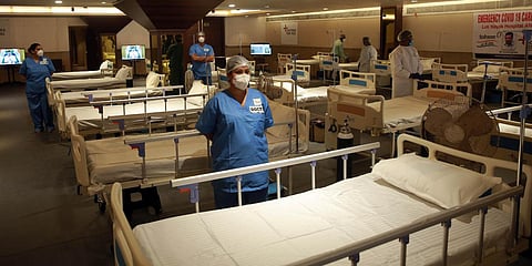 Medics at the Shehnai Banquet Hall that has been temporarily converted into an isolation centre for COVID-19 patients in New Delhi. (Photo| Shekhar Yadav, EPS)