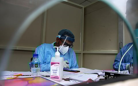 A hospital staff busy at newly inaguated Help Desk for covid 19 patient at LNJP hospital in New Delhi on Thursday.  (Photo | Anil Shakya/EPS)