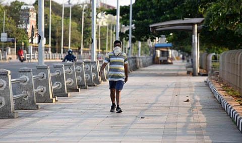 A man walking in the morning at Kamarajar salai near Marina Beach in Chennai. (File Photo | R Satish Babu, EPS)