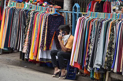 A roadside vendor waits for customers during Unlock 1.0 in Kolkata Friday June 26 2020. (Photo | PTI)