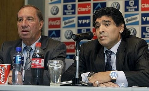 Argentinian football legend Diego Maradona (R) and 1986 World Cup winning coach Carlos Bilardo. (Photo | AFP)