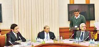 The chairman of Finance Commission, N K Singh (C) with the members at a meeting in New Delhi. (File Photo)