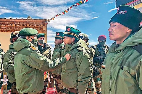 Army Chief Manoj Mukund Naravane speaks to a soldier as he reviews the ground situation in Eastern Ladakh, days after an India-China clash (File photo | PTI)