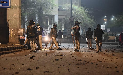 Policemen patrol outside the Jamia Milia University after the violence at the univerityfollowing a protest against new Citizenship law. (File Photo | Parveen Negi, EPS))