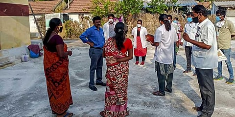 Medical officials busy tracking down the places and people that a man who tested COVID positive came into contact with in Karur in this file photo. (Photo | EPS)