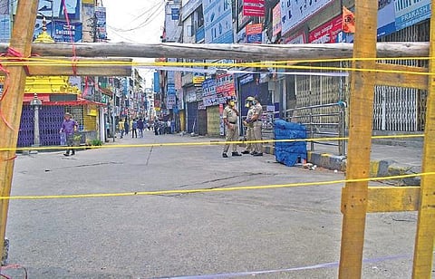 SP Road in Bengaluru was sealed on Wednesday morning after a woman tested positive for Covid-19 in the area | PANDARINATH B