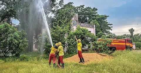 A mock drill being conducted by fire personnel near Kalpana in Bhubaneswar on Wednesday. (Photo| EPS)