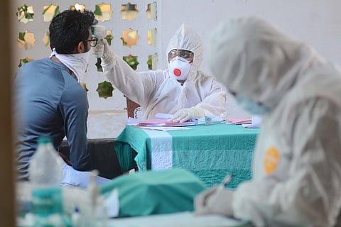 A person getting tested for Covid-19 at Beach Hospital in Kozhikode, Kerala. (Photo | Manu R Mavelil, EPS)