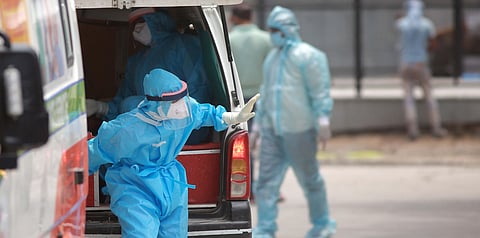 A medical worker in PPE gear outside the Covid-19 ward at LNPJ hospital in Delhi. (Photo | Shekhar Yadav, EPS)