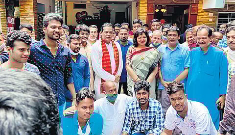 MP Aparajita Sarangi with her supporters outside a BJP leader’s house I Express