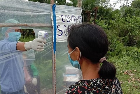 John Panyang screening a woman (Photo | EPS)