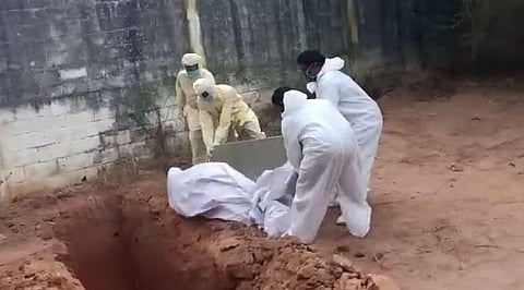 The body was taken out on the stretcher and dumped into a pit dug earlier for the purpose.