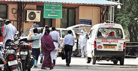 Medical workers in PPE gear outside Ram Manohar Lohia Hospital (Photo | Parveen Negi, EPS)