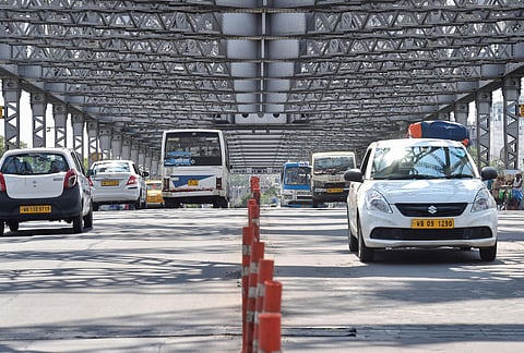 Vehicles cross the Howrah bridge during the ongoing COVID-19 nationwide lockdown in Kolkata Thursday June 4 2020. (Photo | PTI)