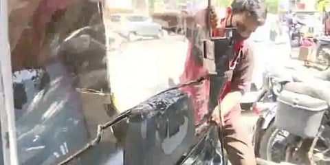 Vicky Nagpal from Mumbai is producing 'isolation covers' for auto-rickshaws. (Photo | ANI)