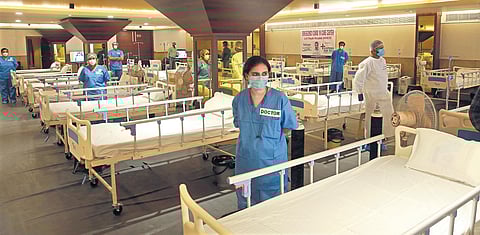 Medics at the Shehnai Banquet Hall that has been temporarily converted into an isolation centre. (Photo| Shekhar Yadav, EPS)V