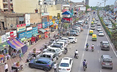 Cars parked at Yusuf Sarai market in New Delhi. (Photo | Shekhar Yadav, EPS)