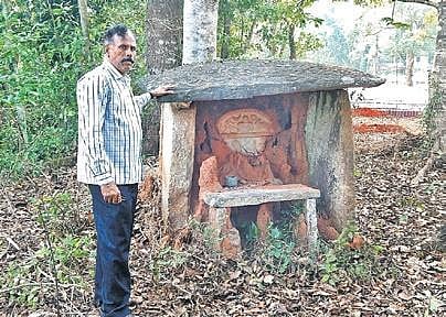 Researcher H R Panduranga in front of  Veera Mahasati temple in Kalasa  | Express