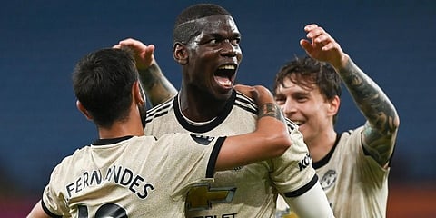 Manchester United's Paul Pogba (C) celebrates with teammates after scoring his team's third goal during the English Premier League match against Aston Villa. (Photo | AP)