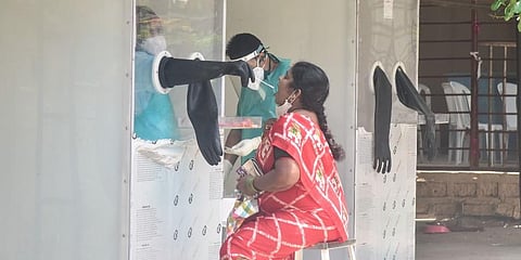 Government Hospital staff collecting samples from patients who came for COVID-19 test. (Photo | Vinay Madapu, EPS)