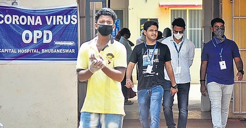 A man comes out from Covid OPD without wearing a mask at Capital Hospital in Bhubaneswar. (File photo| Biswanath Swain, EPS)