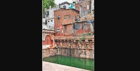 Locals complained that water leakage from houses had caused wall bulging, therefore the structure appeared to be in danger.