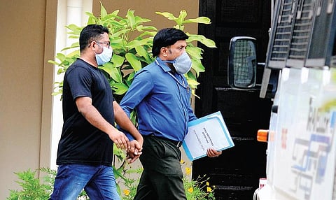 Gold smuggling accused Sandeep Nair being brought to the NIA Court in Kochi on Monday |  A Sanesh