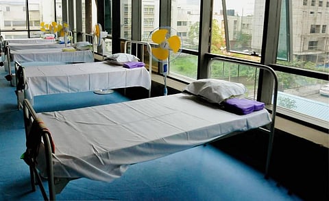 Beds lined at a COVID-19 care centre for patients showing mild symptoms during Unlock 2.0 at South City Business Park in Kolkata Monday July 13 2020. (Photo | PTI)
