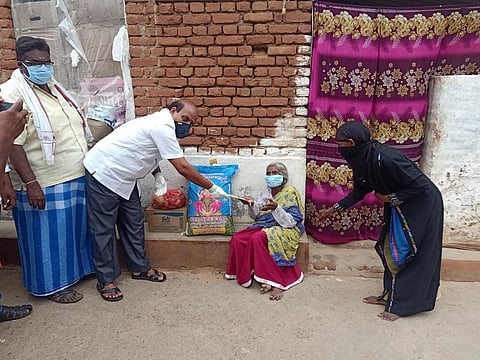 Ambur MLA AC Vilwanathan gave financial assistance, rice, groceries and vegetables to 110-year-old Hamidhabi who recovered from Covid. (Photo| EPS)