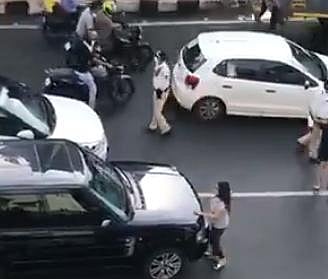 The wife chased the husband's SUV (sports utility vehicle) in her car after she spotted another woman seated next to him in his vehicle. (Photo | Twitter)