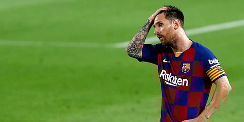 Barcelona's Lionel Messi reacts after the end of a Spanish La Liga soccer match with Osasuna at the Camp Nou stadium. (Photo| AP)