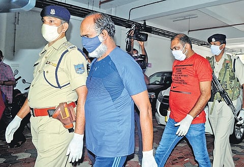 Said Alavi and  Mohammed Anwar T M, who were arrested in connection with the gold smuggling case, coming out of the Additional Chief Judicial Magistrate (Economic Offence) Court in Kochi on Thursday | A Sanesh