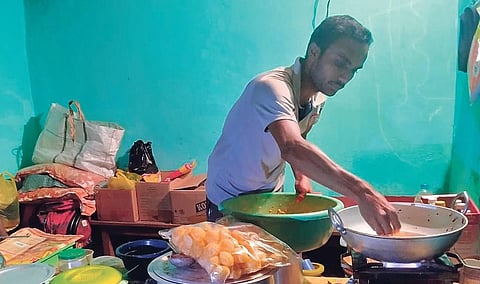 Advocate Prathap Gowda V S dishes up some chaat at the food stall he opened at his native village, Valagerehalli, in Maddur taluk of Mandya district | Express