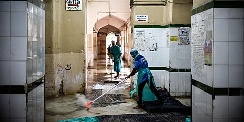 Staff had to be deployed to clear the water stagnation in Hyderabad's Osmania General Hospital. (Photo| Vinay Madapu, EPS)