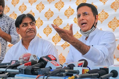 Senior Congress leader Randeep Surjewala with Rajasthan Congress President Govind Singh Dotasra addresses a press conference in Jaipur Friday July 17 2020. (Photo | PTI)