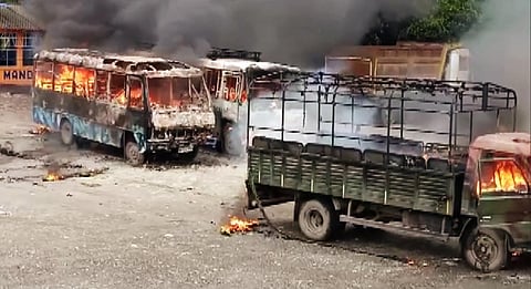 Locals set police vehicles and  buses on fireduring a protest against an alleged gang-rape and murder of a girl in Kalagachh in Uttar Dinajpur. (Photo| ANI)