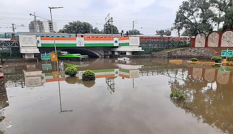 A DTC bus almost submerged at waterlogged Minto Bridge underpass after rains in New Delhi on Sunday.  (Photo | Shekhar Yadav, EPS)