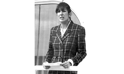 In this Nov. 7, 1991, file photo Ghislaine Maxwell, daughter of late British publisher Robert Maxwell, reads a statement in Spanish in which she expressed her family's gratitude to the Spanish authorities, aboard the 'Lady Ghislaine' in Santa Cruz de Tene