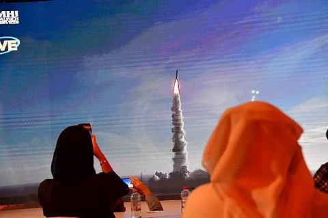 A picture taken on July 19, 2020, shows a screen broadcasting the launch of the 'Hope' Mars probe at the Mohammed Bin Rashid Space Centre in Dubai.  (Photo | AFP)