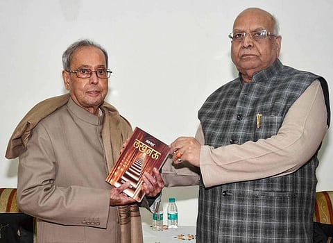 In this Monday Jan 21 2019 file photo Madhya Pradesh governor and BJP veteran Lalji Tandon presents his book 'Ankaha Lucknow' to former president Pranab Mukherjee in Patna. (File | PTI)