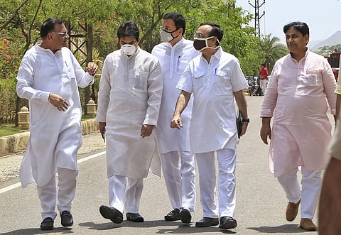 Senior Congress leaders Randeep Surjewala C KC Venugopal Avinash Pandey Ajay Maken and other leaders with newly elected Rajasthan Congress President Govind Singh Dotasara R after a MLA's meeting at a hotel in Jaipur. (Photo  PTI)