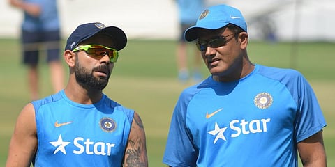 Former Indian cricket team head coach Anil Kumble (R) with skipper Virat Kohli (Photo | EPS)