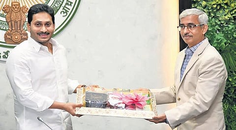 Chief Minister YS Jagan Mohan Reddy with Amul Chennai head Rajan at his camp office in Tadepalli on Tuesday | EXPRESS