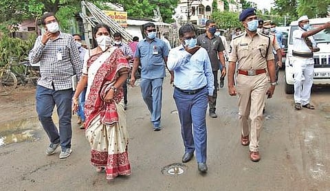 Collector I Samuel Anand Kumar, SP RN Ammi Reddy and GMC Commissioner  C Anuradha inspect containment zones in Guntur city | Express