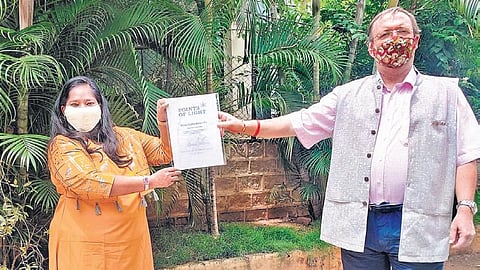 Dr Andrew Fleming, British Deputy High Commissioner to TS and AP, presents  Manju Latha Kalanidhi the 149th Commonwealth Point of Light Award on Friday