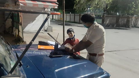 Every evening, after the hectic day of duty ends, Dixit makes it a point to spend an hour or two teaching the Class VI student Raj. (Photo | EPS)
