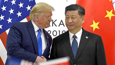 US President Donald Trump, left, shakes hands with Chinese President Xi Jinping during a bilateral meeting on the sidelines of the G20 leaders summit in Osaka, Japan, June 29, 2019.