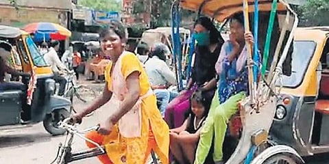 Nandini Kumari says women prefer to hire her for rickshaw rides. (Photo | EPS)